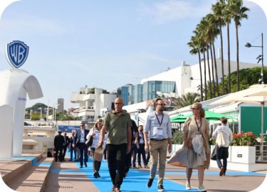 Exhibit MIPCOM