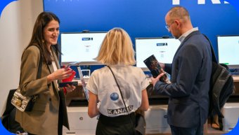 Exhibit MIPCOM